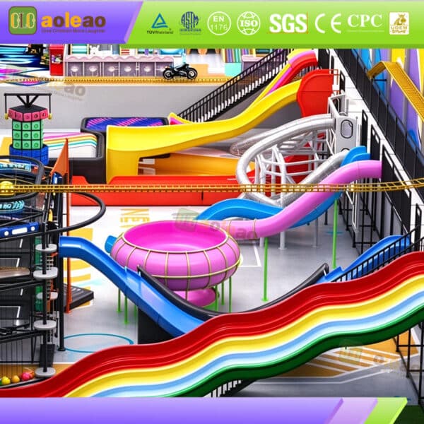 Commercial indoor slide park with rainbow wave slides and curved slide attractions