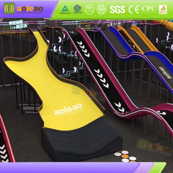 Indoor slide park equipment with yellow wave slide and giant slides